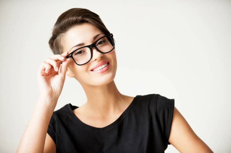 Smiling woman in stylish glasses